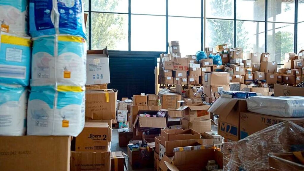 Warehouse filled with stacked boxes and inventory items