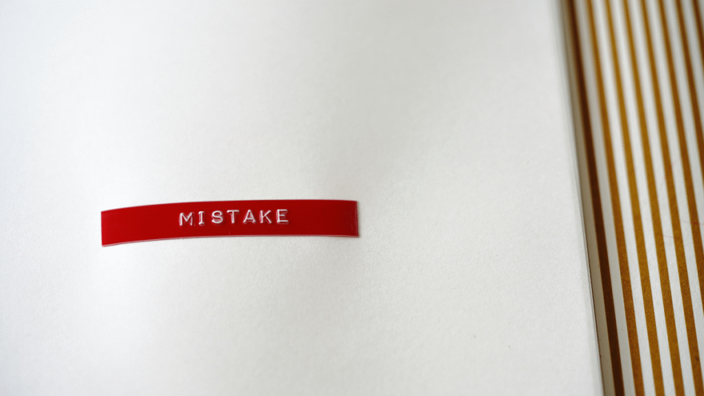 Red label displaying the word “Mistake”