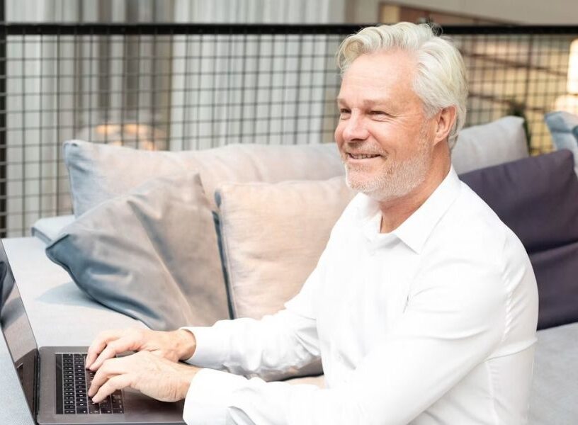 ERP Software for Australian Businesses Business owner working on a laptop
